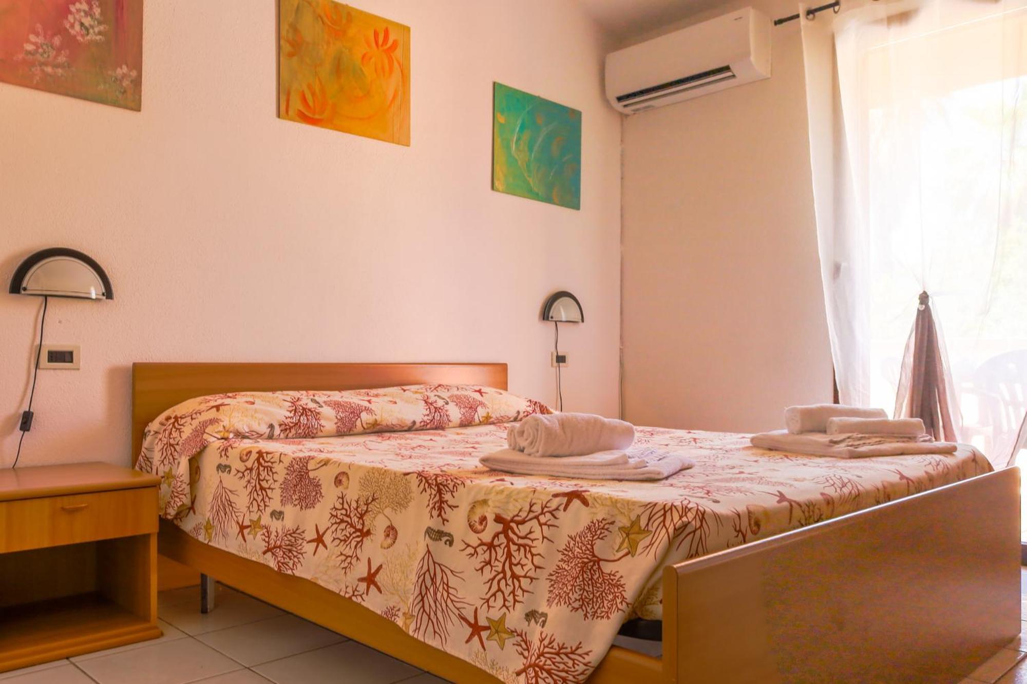 Residence Oasi Anfiteatro ポルト・オッティオル エクステリア 写真